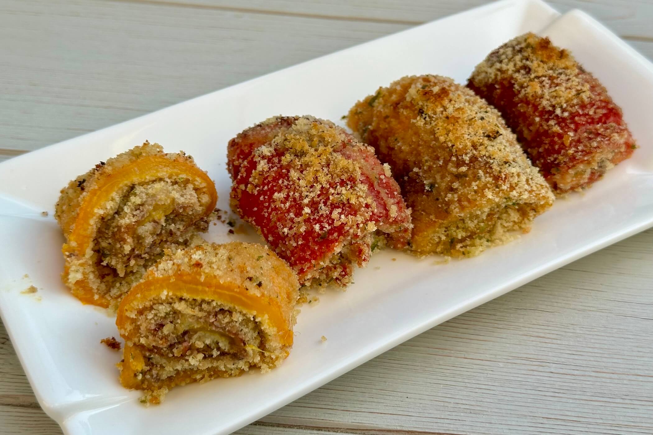 Involtini di peperoni gratinati, la ricetta irresistibile