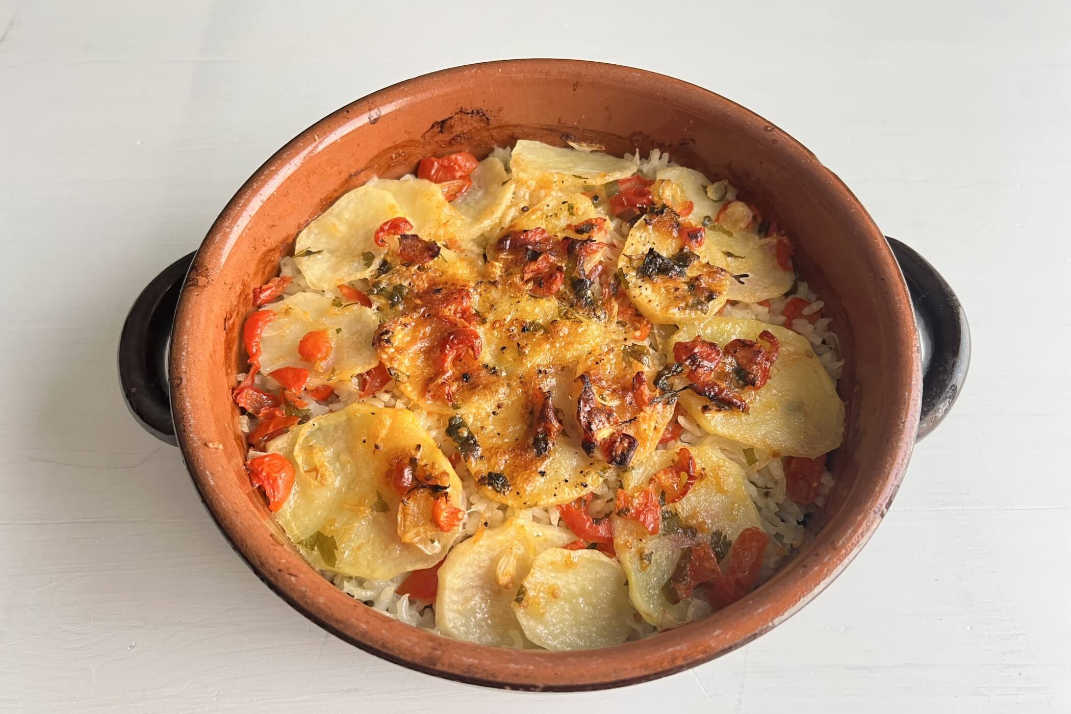 Riso patate e cozze: la ricetta della tiella barese